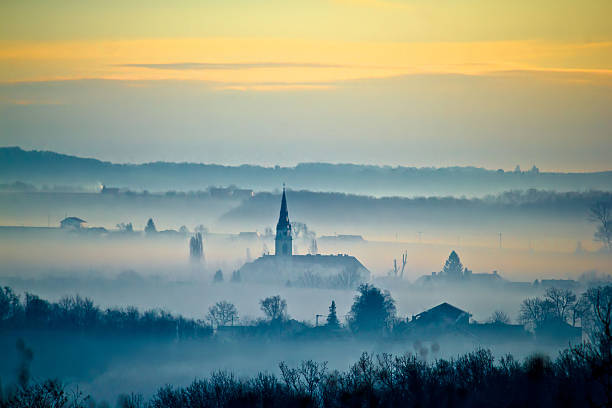 istock Krizevci cathedral in fog landscape 531008405