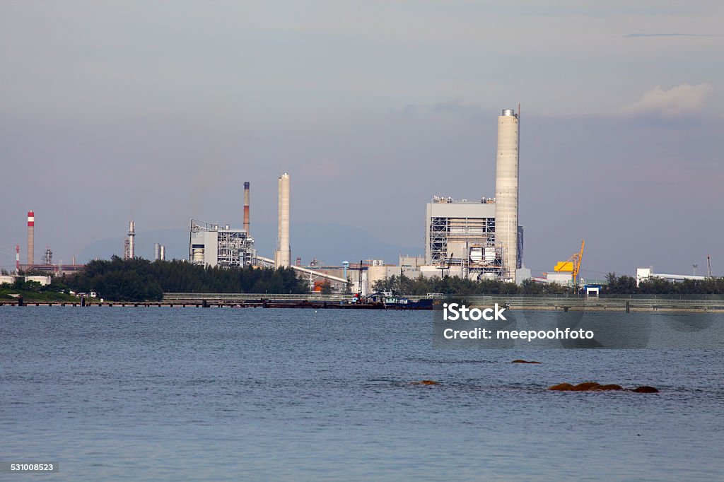 Coal fired eletric power plant near jetty Coal fired electric power plant near jetty 2015 Stock Photo