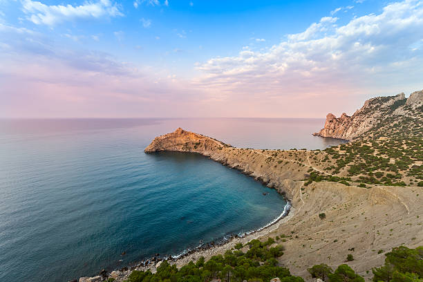 istock Beautiful sunset above the sea and mountain 531008633