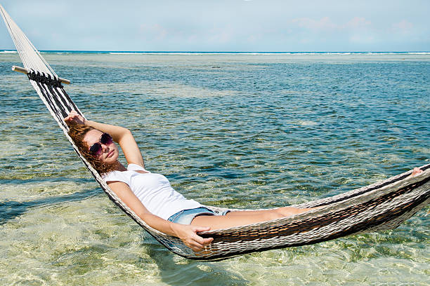 istock Girl Relaxing In Hammock 531009070