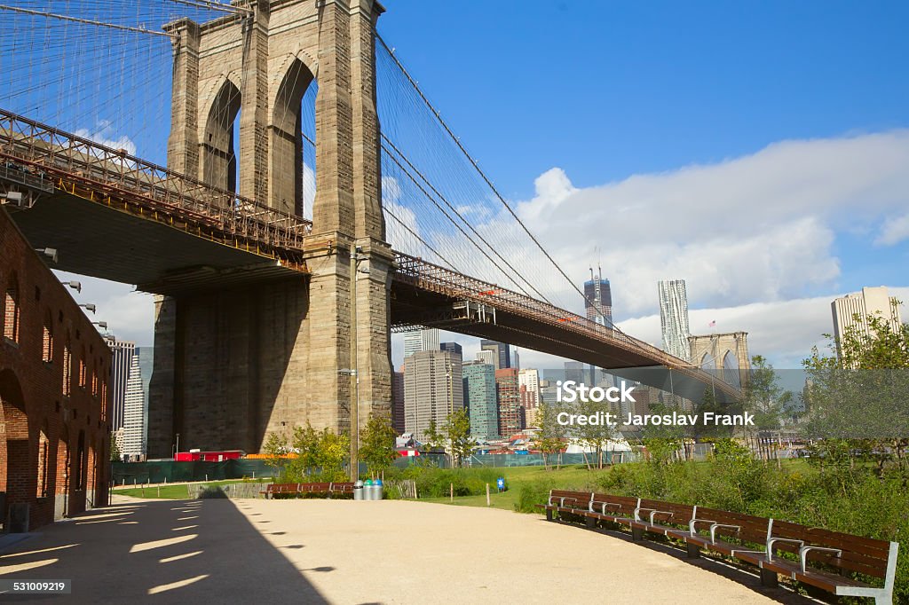 Park with benches near the Brooklyn Bridge Park with benches near the Brooklyn Bridge (New York City) Brooklyn Bridge Park Stock Photo