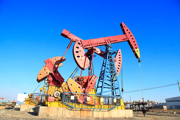 istock Oil field, oil pump in the work 531010118