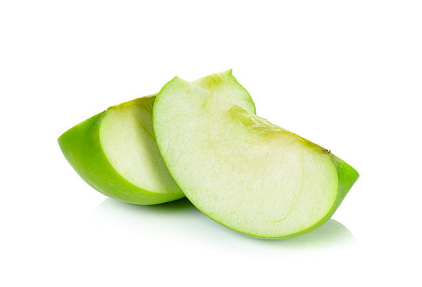 istock Sliced Green apple isolated on the white 531012482