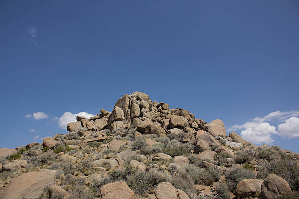 istock Rock boulders with a blue sky in the back ground 531013044