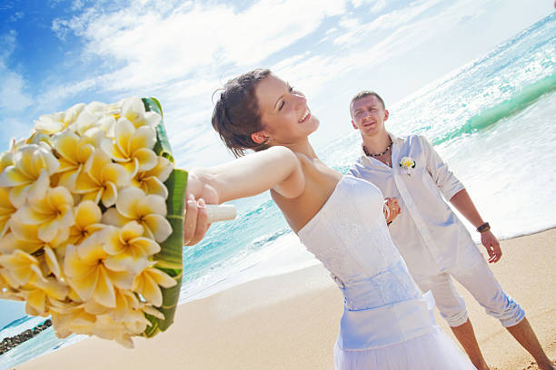 istock Bride and groom on the beach 531014027