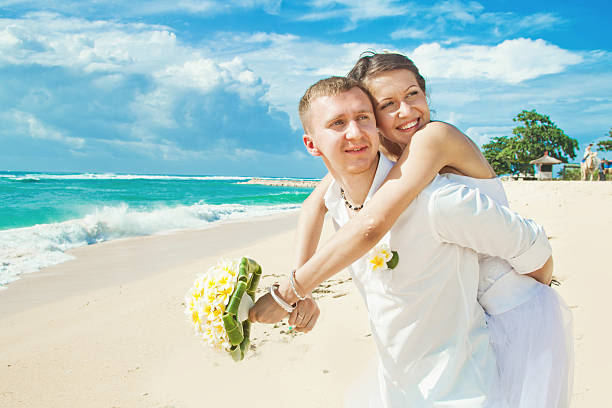 istock Bride and groom on the beach 531014033