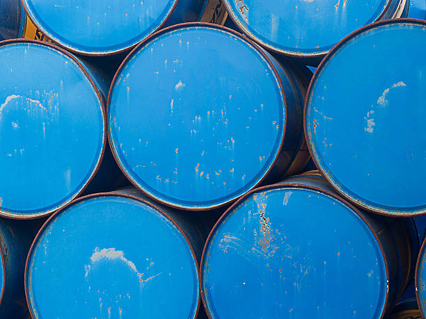 istock oil drums stacked together in a yard 531019859