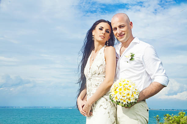 istock Bride and groom against sea view 531037051