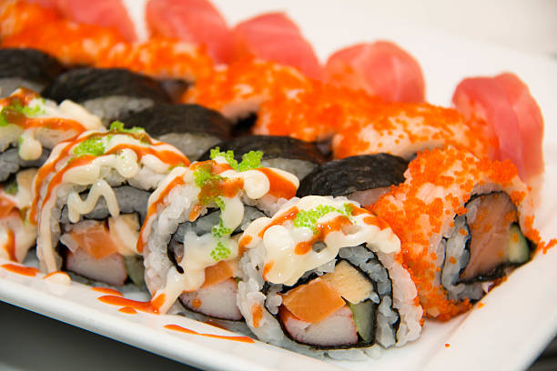 istock Japanese seafood sushi roll on the white plate. 531037393