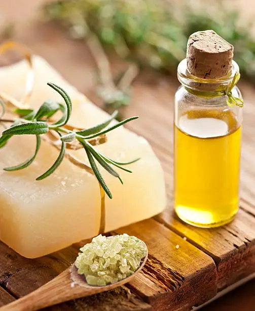 Piece of natural soap with rosemary.