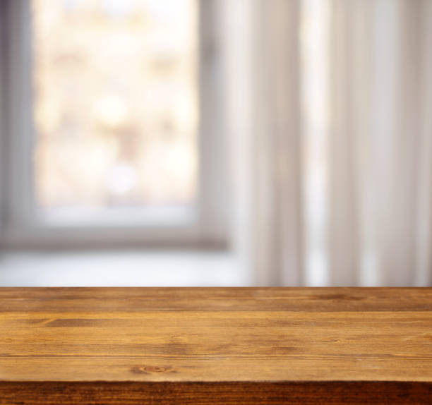 istock wooden background and defocused window 531042180