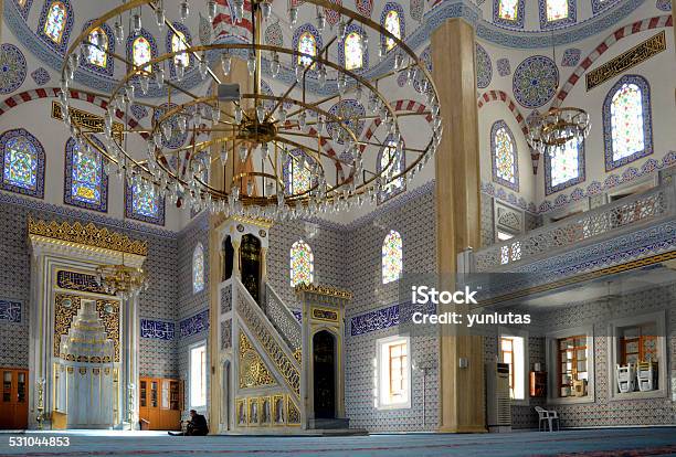 Muslims Find Peace By Reading The Quran At The Mosque Stock Photo - Download Image Now