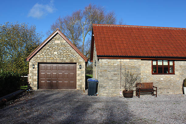 istock Detached garage building, barn conversion house / bungalow, converted stables / wheelie-bins 531045773