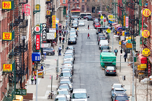 elevated view of a street in Chinatown, New York City, horizontal orientation, America, USA.