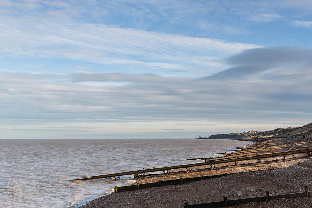 reculver башни наблюдалось herne бухта - herne bay стоковые фото и изображения