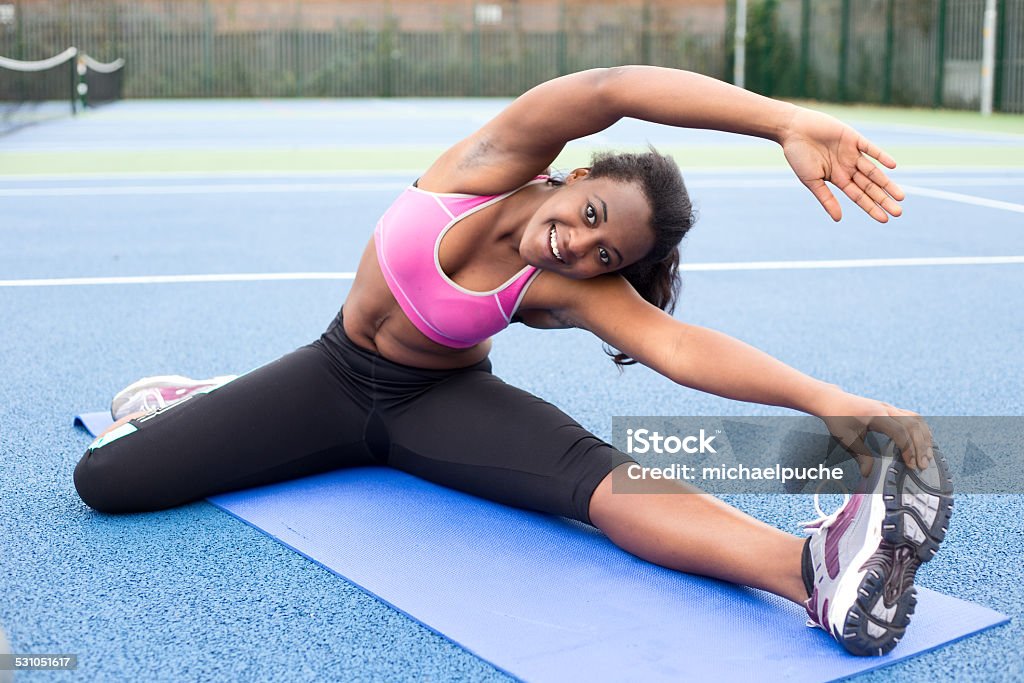 fitness young woman stretching 2015 Stock Photo