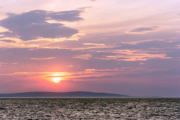 istock Sunset Penmon Angelsey Wales UK 531052266