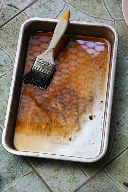 istock cleaning oil in try with brush 531057793