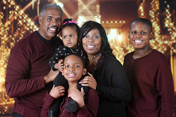 istock Christmas Family Outside a Mall 531058113