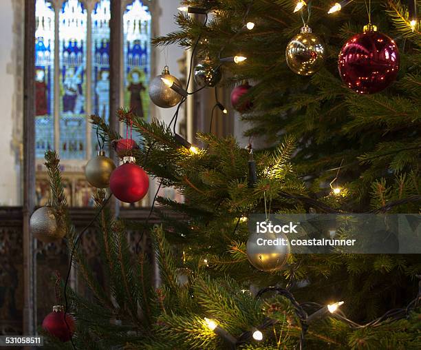 Decorated Christmas Tree In An English Church Stock Photo - Download Image Now - Church, Christmas Tree, Christmas