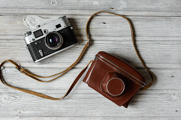 istock Vintage photo camera with the brown leather case 531058778