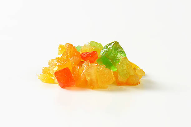 candied fruit heap of candied fruits on white background candied fruit stock pictures, royalty-free photos & images