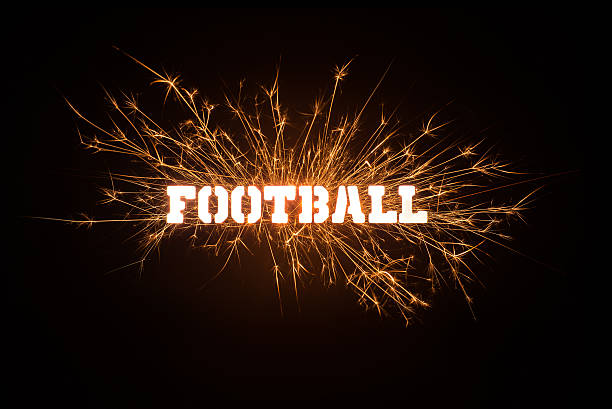 istock Sparkly FOOTBALL title on black background 531059325