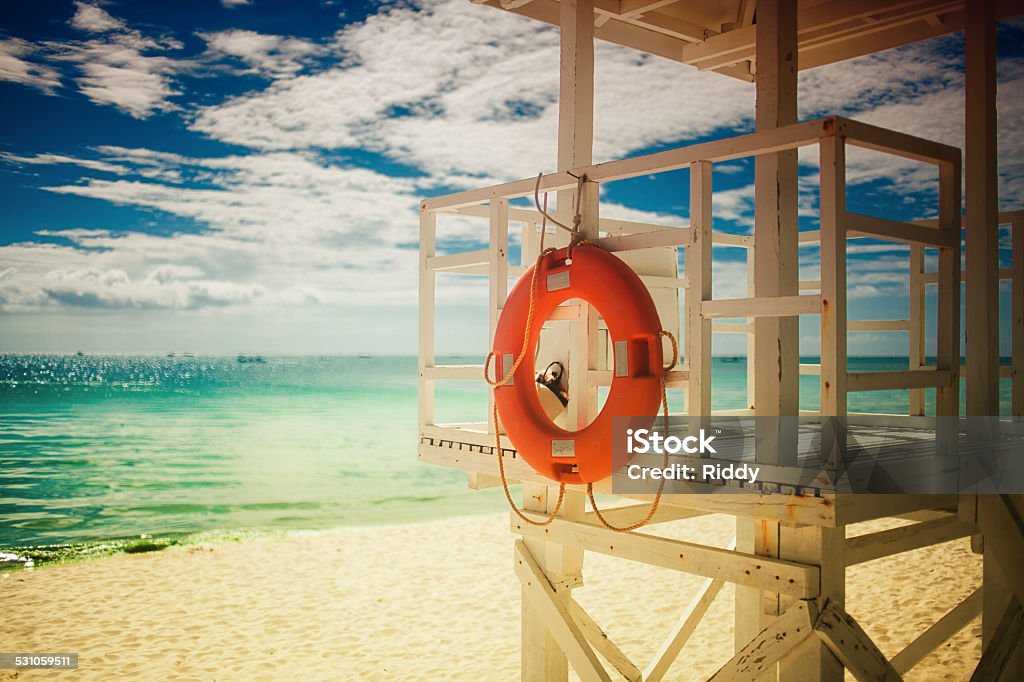 Lifebuoy Lifebuoy on the beach, a tropical coastline 2015 Stock Photo