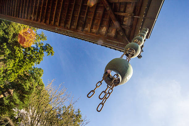 Tokyo, Japan - April 5, 2016: A 'rain chain' hangs off the rooftop on the outside of Oyama Shrine (built in 1599) in Kanazawa, Ishikawa Prefecture. It is a Shinto shrine.