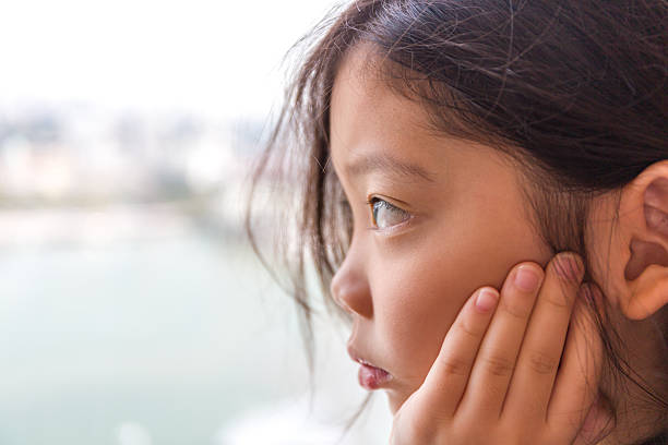 istock Child Looking Out of Window 531060164