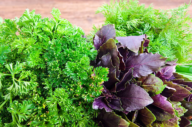 istock Fresh green vegetables on a wooden background 531062637