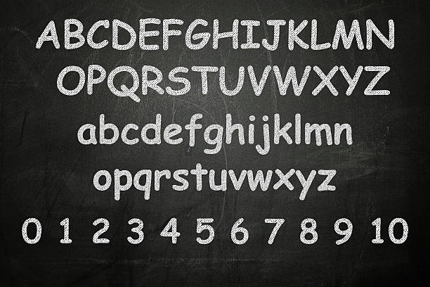 istock English Alphabet with numbers on a blackboard 531062713