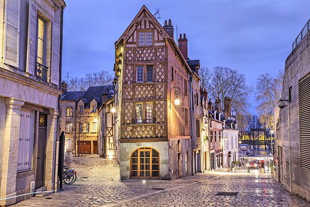 Half-timbered house in the center of Orleans Street, paved with stone blocks and half-timbered house in the center of Orleans, France orleans france photos stock pictures, royalty-free photos & images