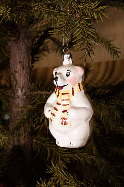 istock Christmas Toy Polar Bear with scarf hanging on Christmas tree 531064803