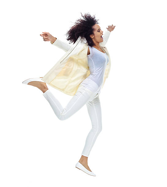 Cheerful woman jumping with arms outstretchedhttp://www.twodozendesign.info/i/1.png