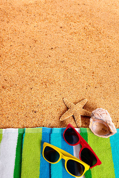 istock Tropical summer beach background, sunglasses, couple sunbathing, 531065800