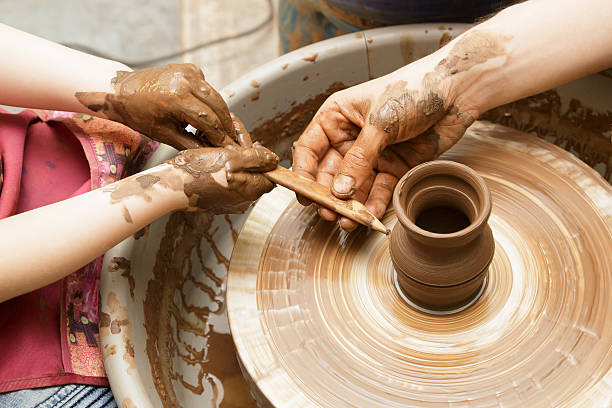 istock We do a pot on a potter's wheel 531066364