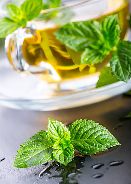 istock Mint leaves.Mint Tea. Herbal tea. Tea in a glass cup. 531066378