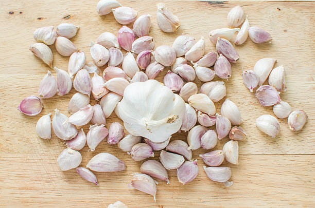 istock sliced garlic on wooden background 531067572