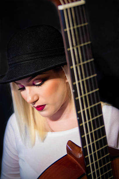 istock Girl playing a guitar. 531068444