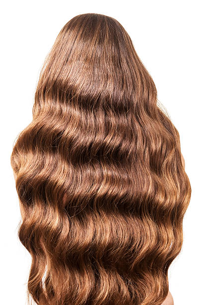 istock Gorgeous wavy hair flowing her back close up, isolated on 531070144