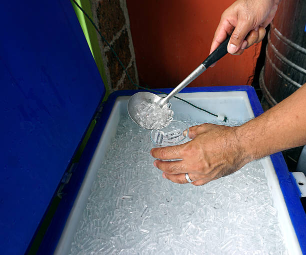 istock man's hand get the tube shape ice in container 531071978