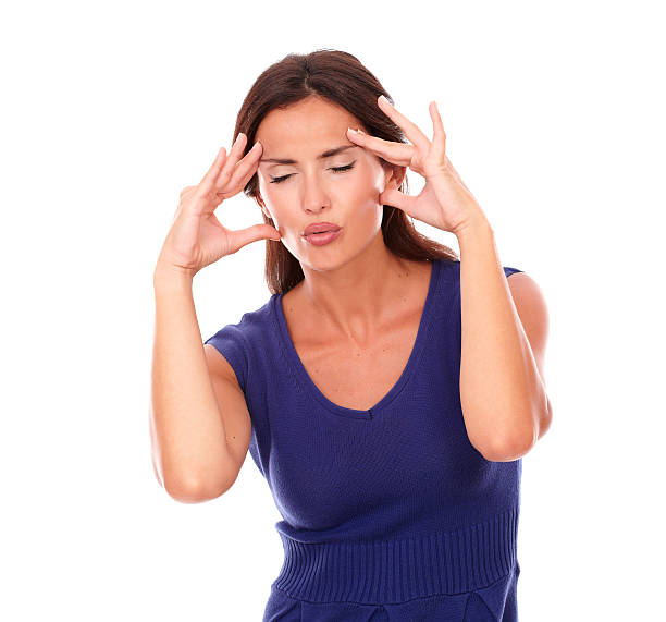 istock Pretty woman with hand on head and closed eyes 531072251