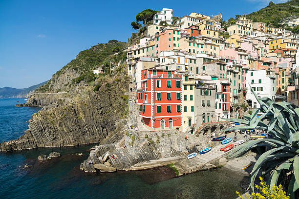 istock Riomaggiore village on cliff rocks and sea 531073471