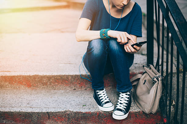 istock Girl texting on smartphone 531073991