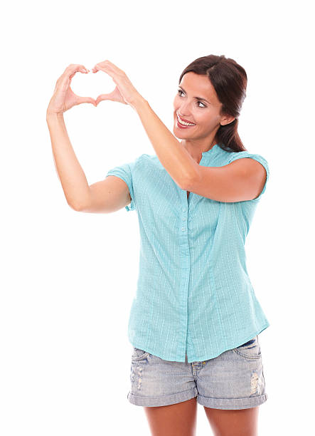 istock Pretty latin lady looking at a love sign 531074795