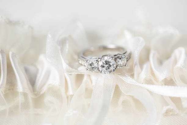 istock Engagement ring in garter belt 531074803