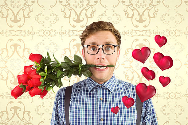 istock Composite image of geeky hipster biting roses 531078015