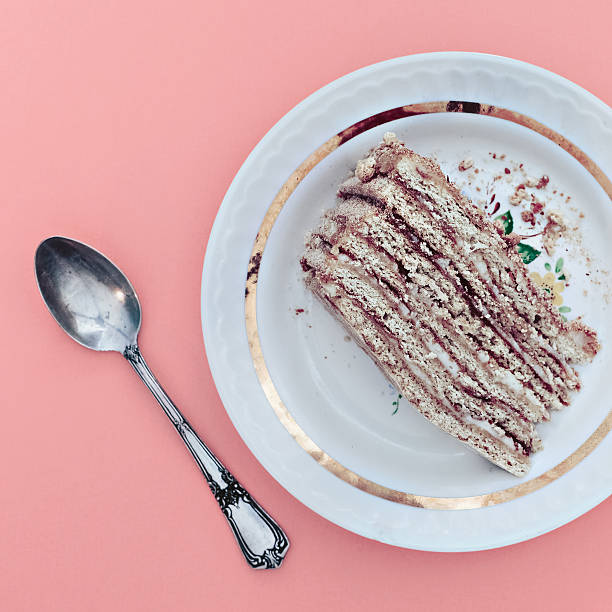 istock Piece of honey cake on a saucer 531083281