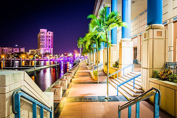 The Convention Center and Riverwalk at night in Tampa, Florida. stock photo